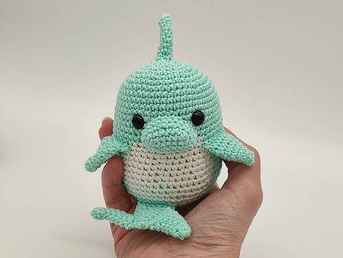 eggy-dolphin-in-hand