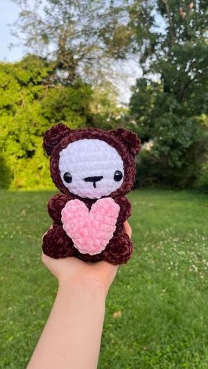 crochet bear in brown onesie